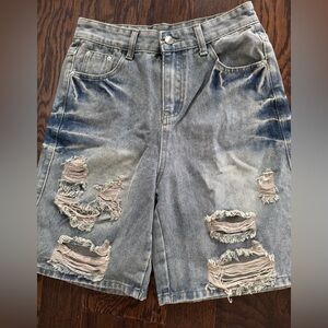 Distressed Denim Men Shorts size 28 waist but says it is a large.
